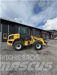 New Holland W70C لوادر بعجل