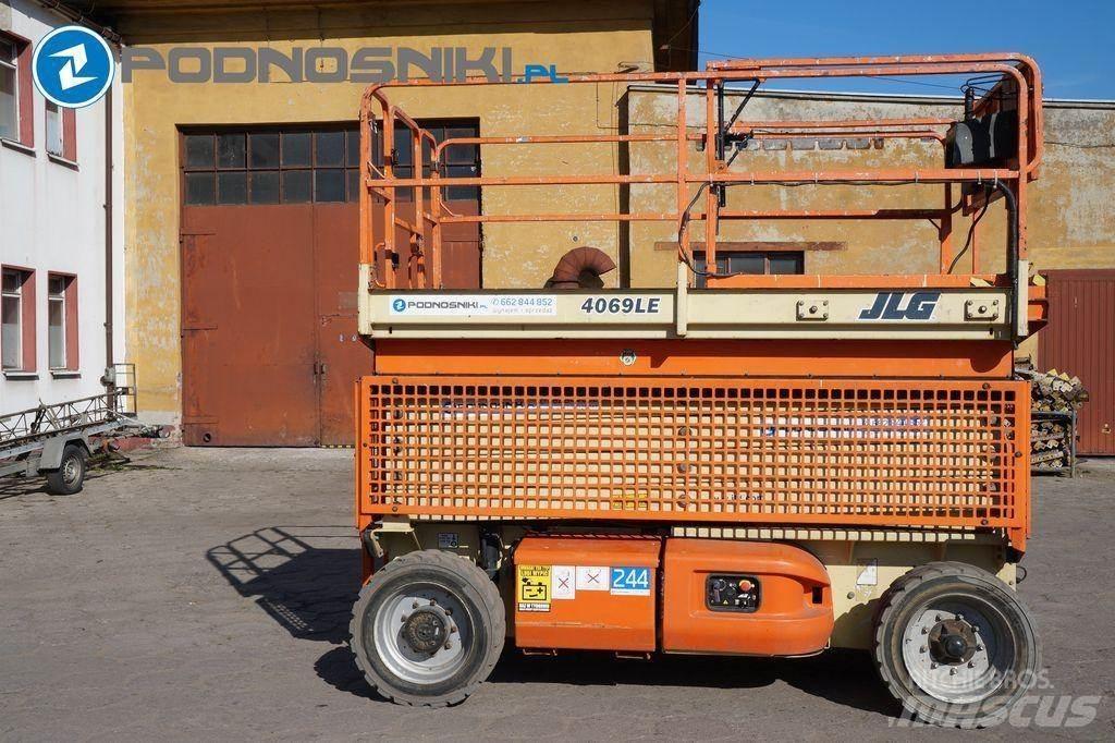 JLG 4069 رافعات مقصية الشكل