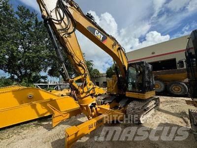 CAT 325FL CR مناولات المخلفات / مناولات صناعية