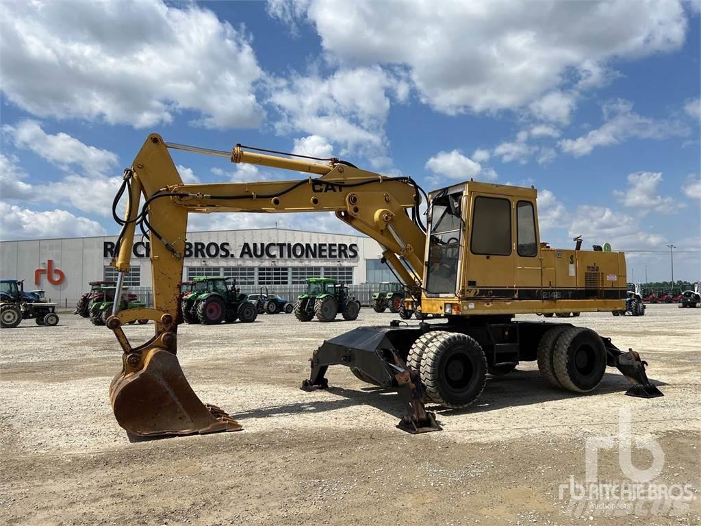 CAT 214BFT حفارات بعجل