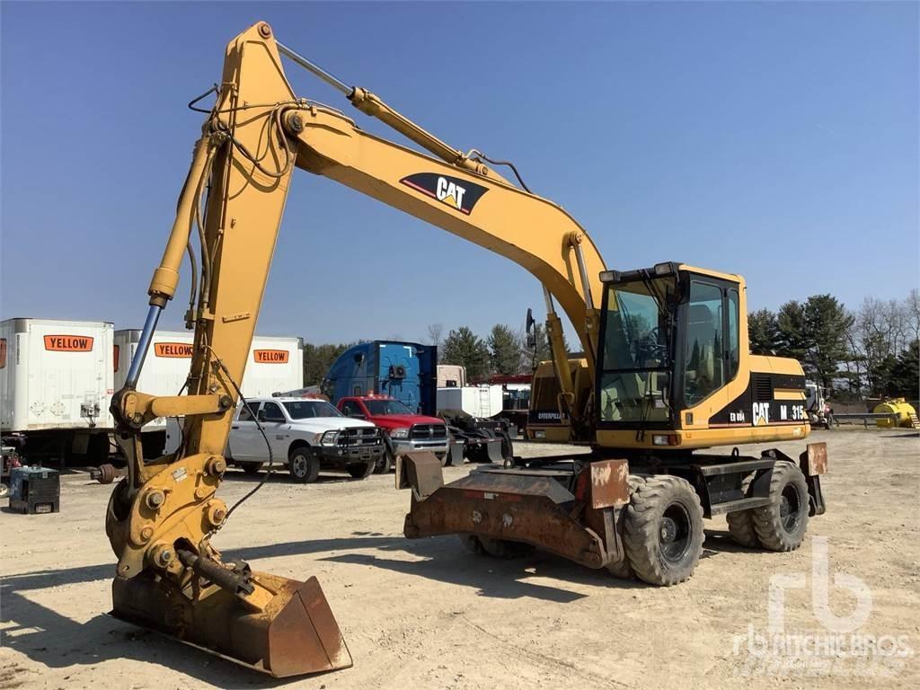 CAT M315 حفارات بعجل