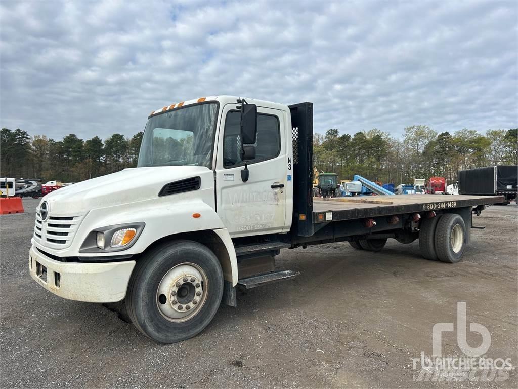 Hino 268 شاحنات مسطحة/مفصلية الجوانب