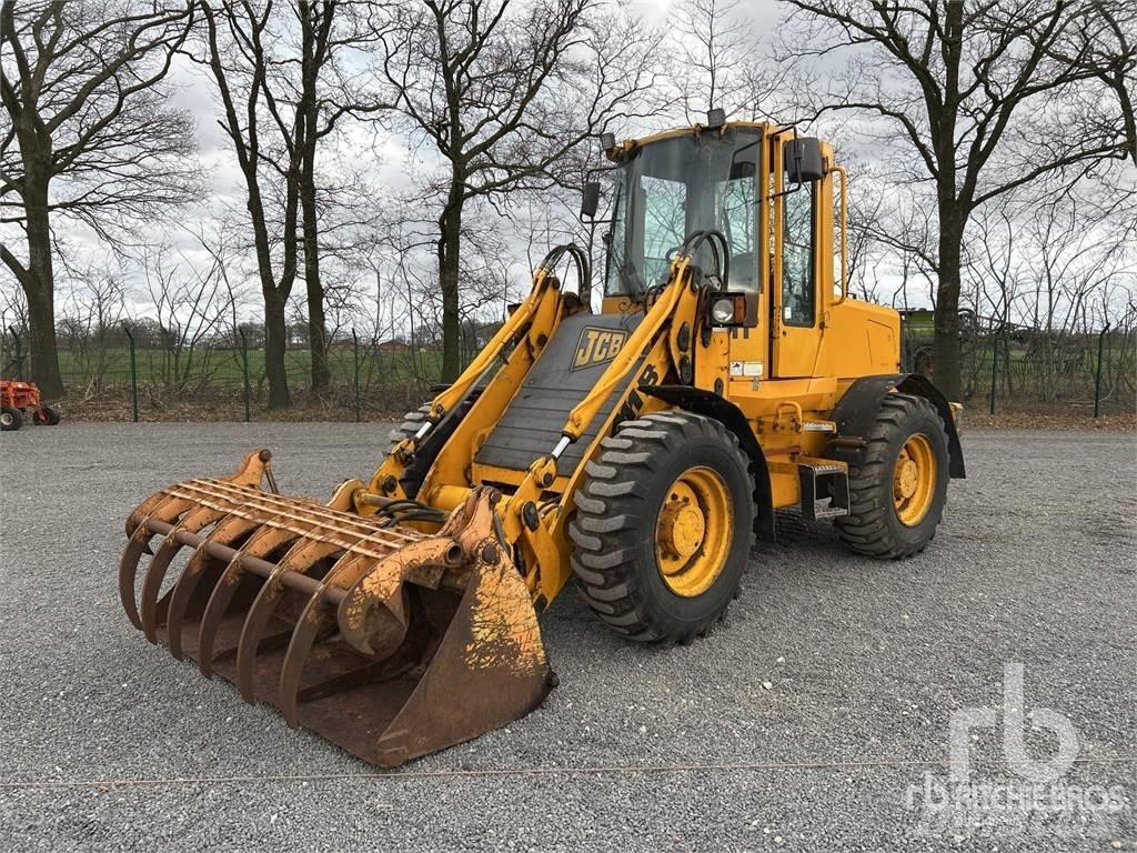 JCB 411 لوادر بعجل