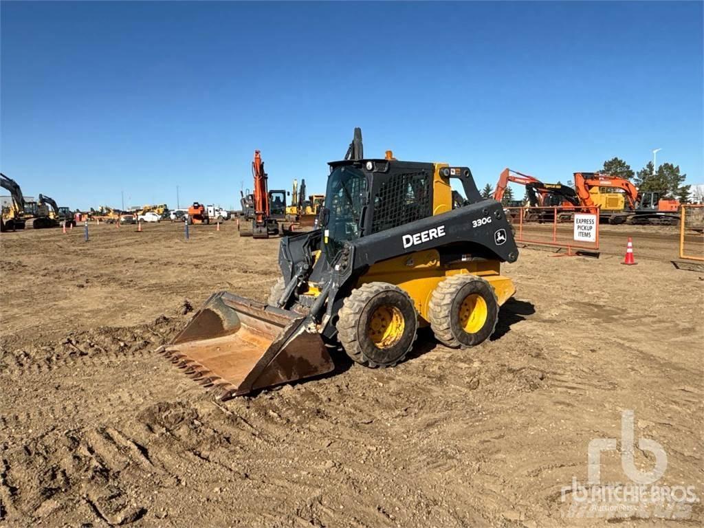 John Deere 330G لوادر انزلاقية التوجيه