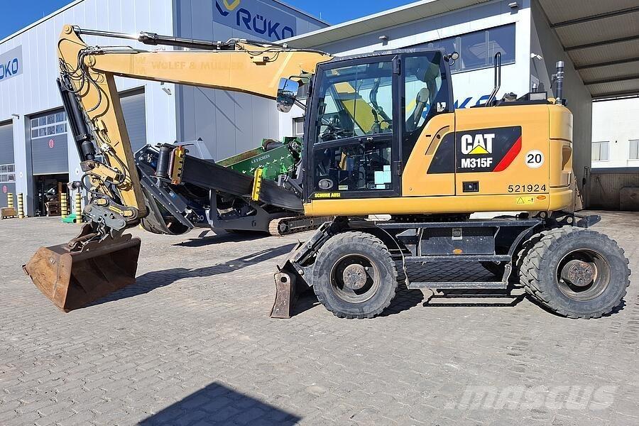 CAT M 315 F حفارات بعجل