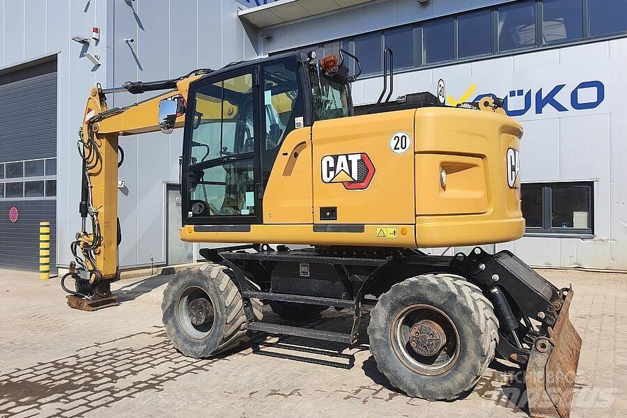 CAT M 317 F حفارات بعجل