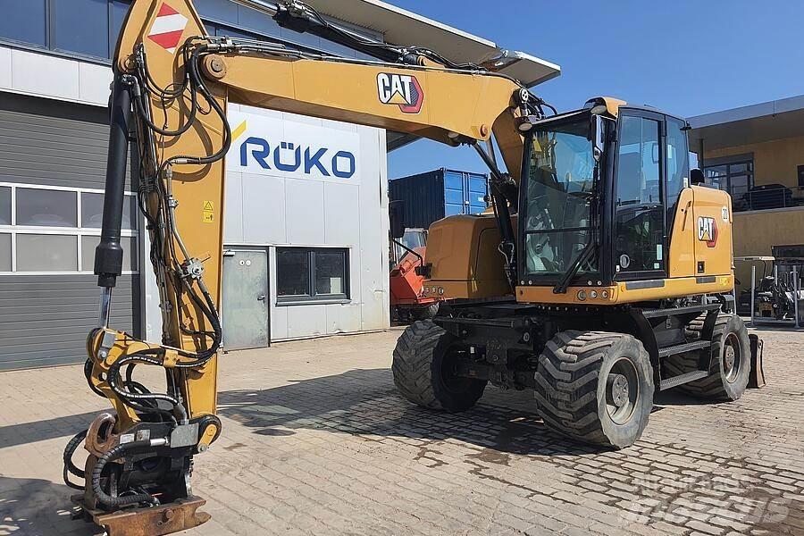 CAT M 317 F حفارات بعجل