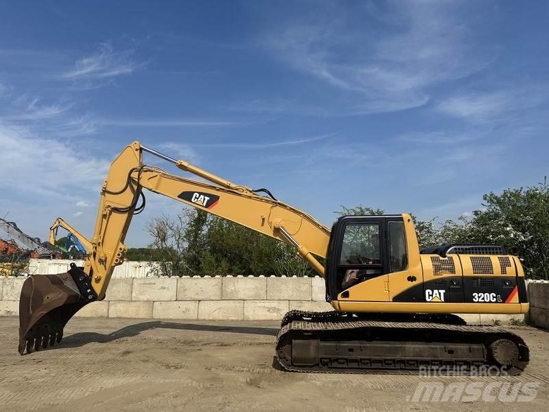 CAT 320 حفارات زحافة