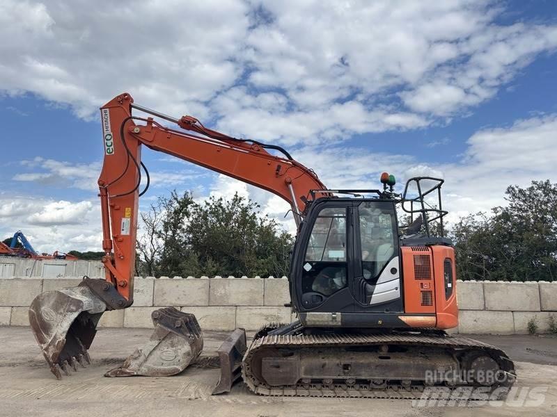 Hitachi ZX135 US-6 حفارات زحافة