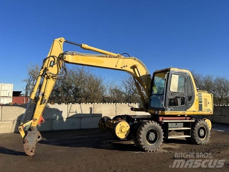 Komatsu PW130-6 حفارات بعجل