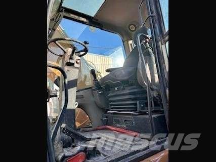 CASE WX210 حفارات بعجل