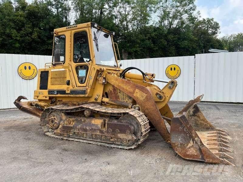 CAT 943 لوادر زحافة