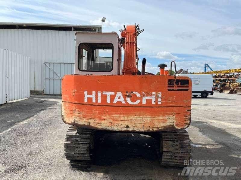 Hitachi EX60 حفارات زحافة