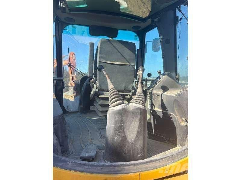 JCB 4CX لوادر ذات جرافات عكسية