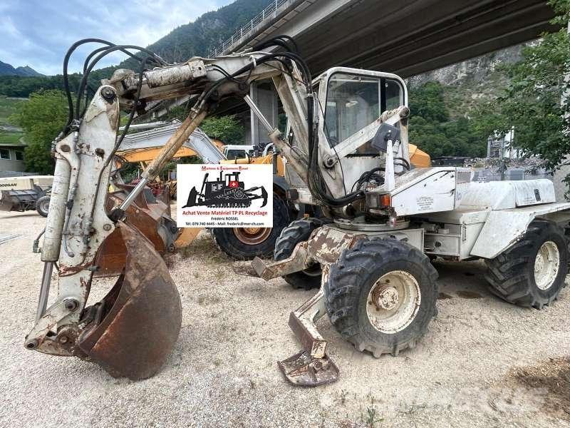 Mecalac 8CXI حفارات بعجل