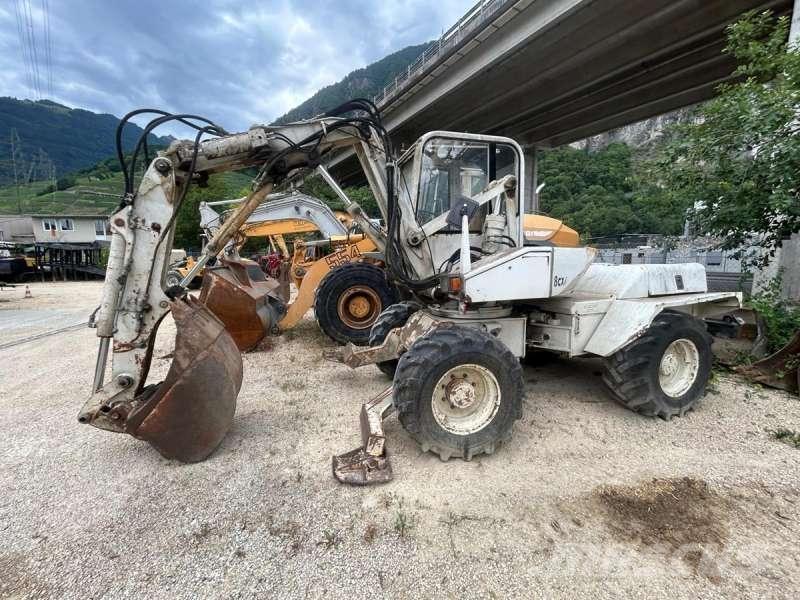 Mecalac 8CXI حفارات بعجل