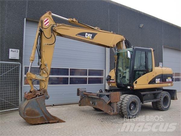 CAT M315C حفارات بعجل