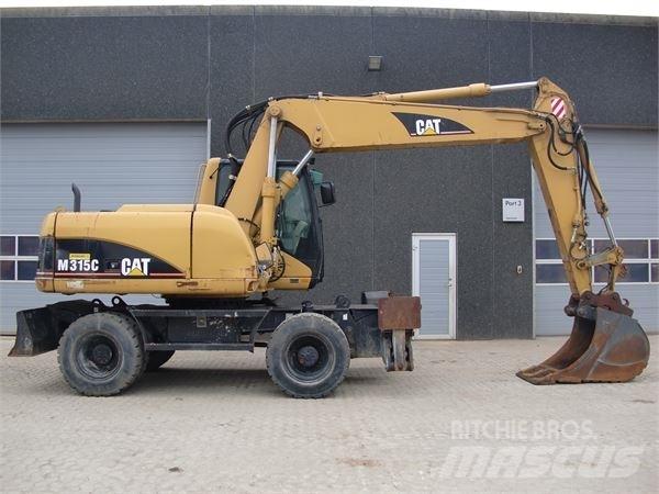 CAT M315C حفارات بعجل