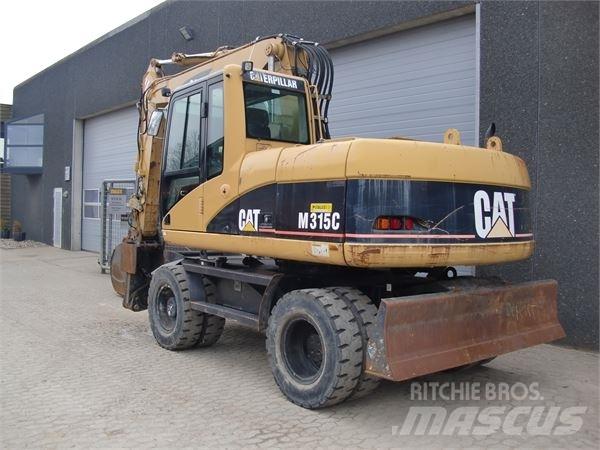 CAT M315C حفارات بعجل