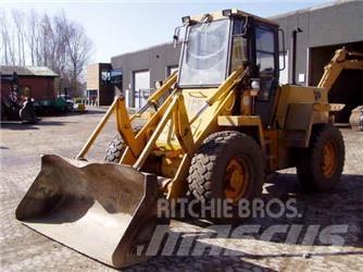 JCB 410 لوادر بعجل