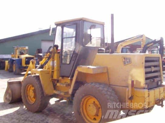 JCB 410 لوادر بعجل