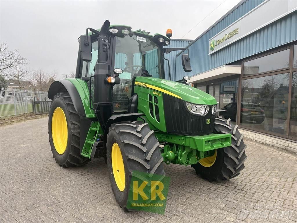 John Deere 6100M الجرارات