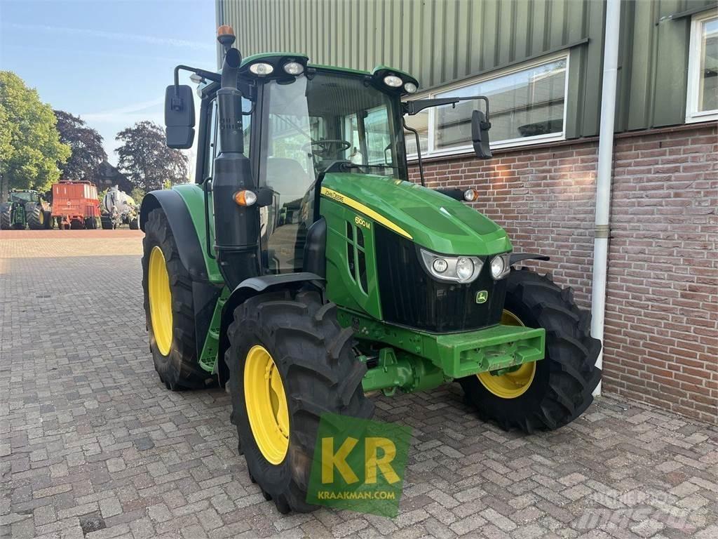 John Deere 6100M الجرارات