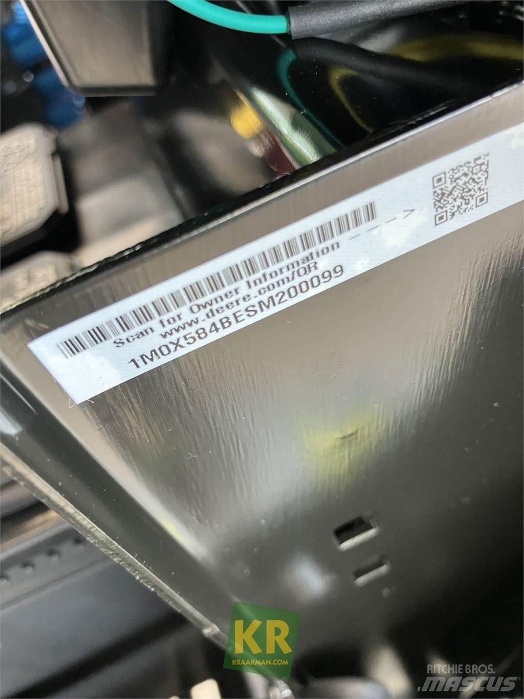 John Deere X584 ركوب الحشائش