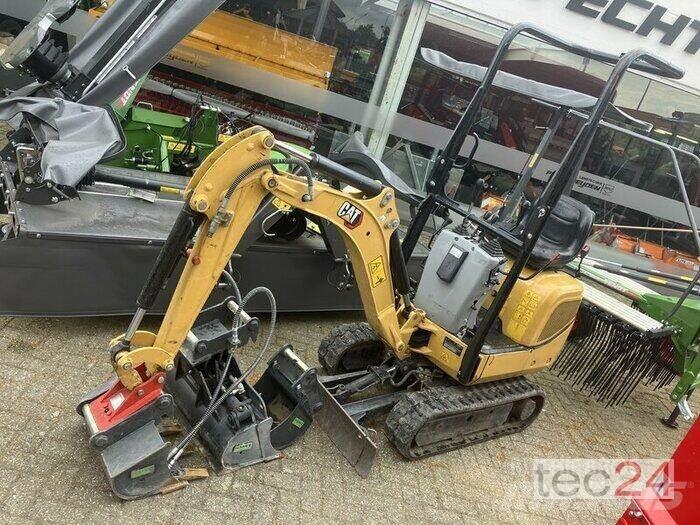 CAT 300.09D حفارات بعجل
