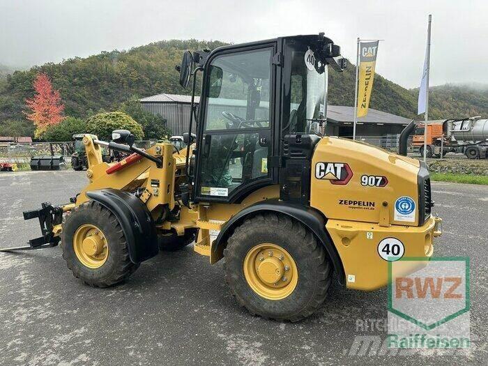 CAT 907 لوادر بعجل