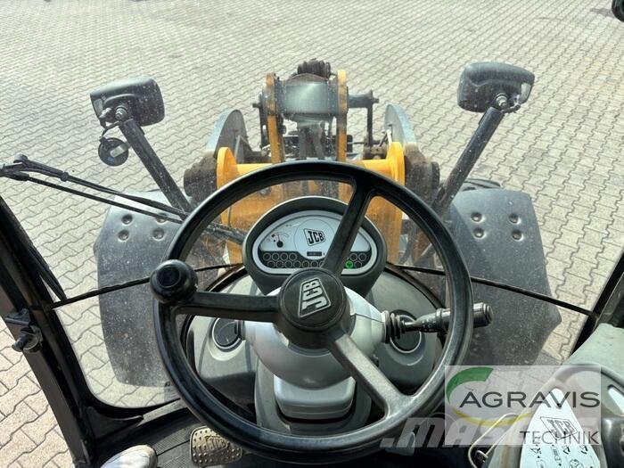 JCB 409 لوادر بعجل