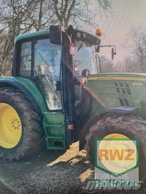 John Deere 6115 M الجرارات
