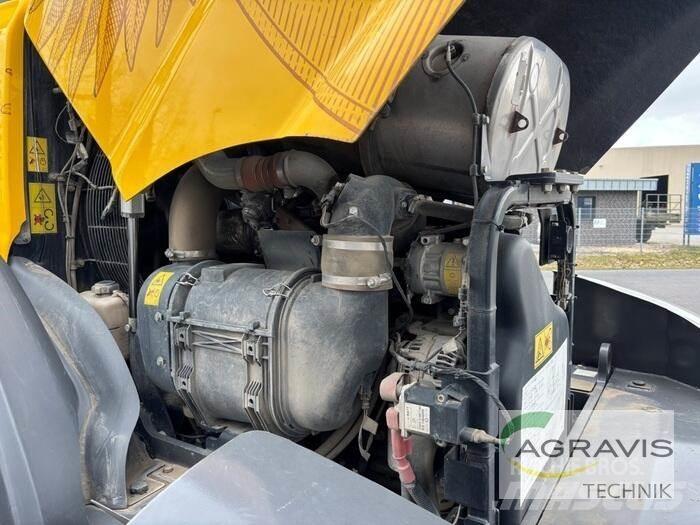 New Holland 921 G لوادر بعجل