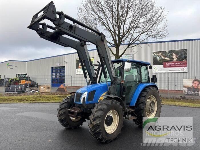 New Holland TLA 100 الجرارات