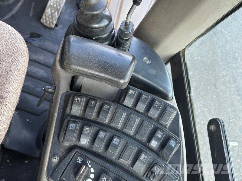 CASE 721 E لوادر بعجل