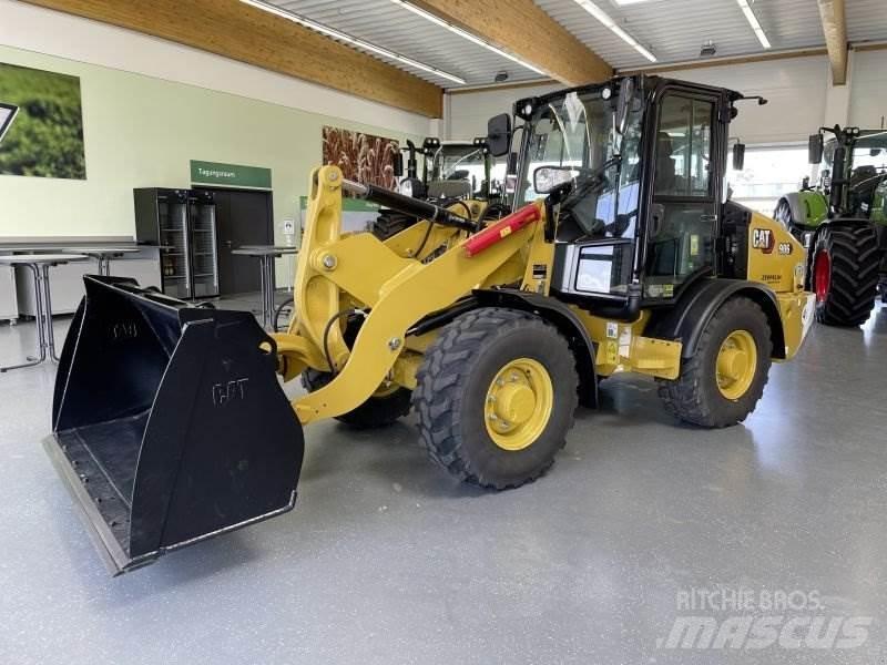 CAT 906-14A T لوادر بعجل