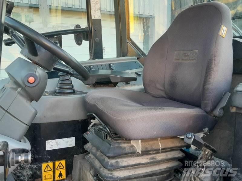 JCB TM 220 لوادر بعجل