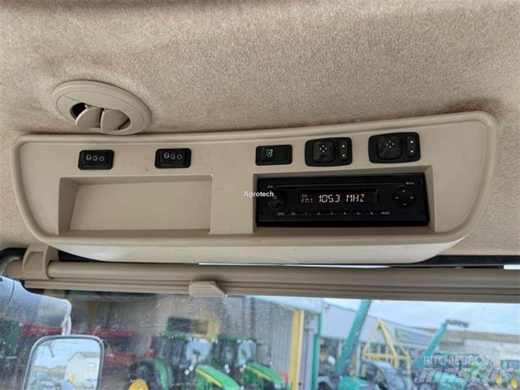 John Deere 8370 R الجرارات
