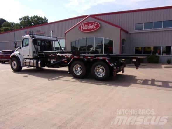Peterbilt 548 شاحنات المخلفات