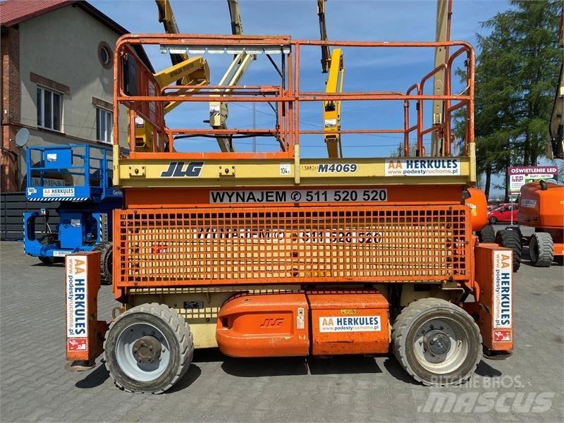 JLG 4069 رافعات مقصية الشكل