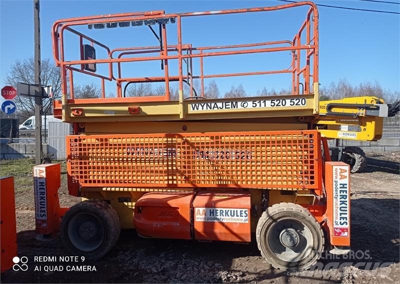 JLG 4069 رافعات مقصية الشكل