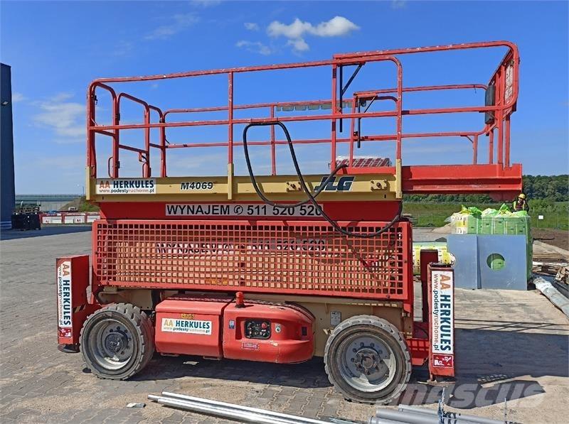 JLG 4069 رافعات مقصية الشكل