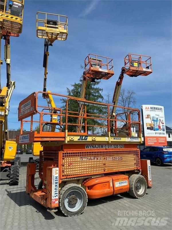JLG 4069 رافعات مقصية الشكل