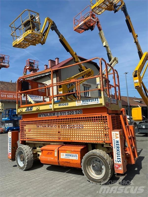 JLG 4069 رافعات مقصية الشكل