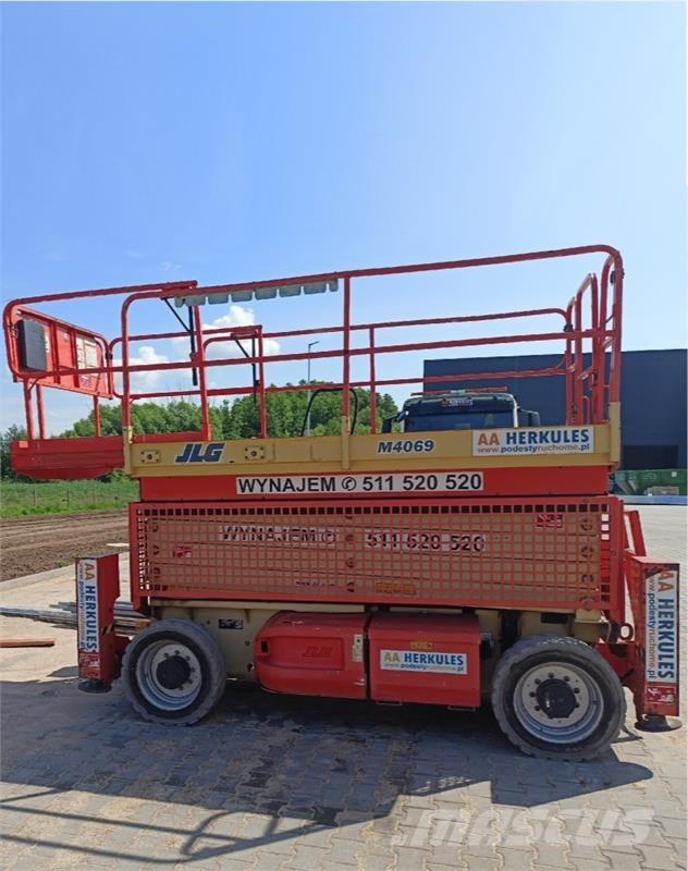 JLG 4069 رافعات مقصية الشكل