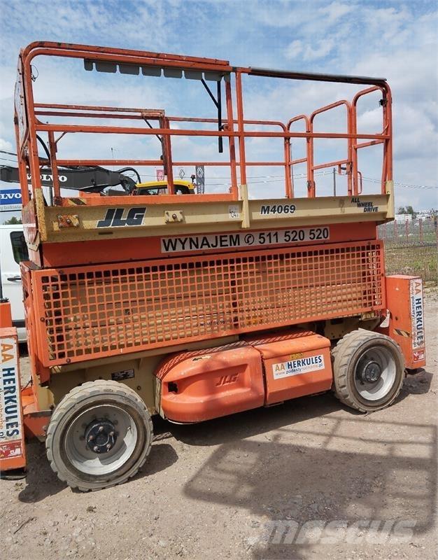 JLG 4069 رافعات مقصية الشكل